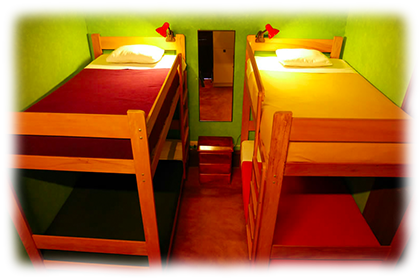 2 Beds in Private Room<br><br>First floor private dormitory with 2 bunk beds and shared bathroom.<br><br><small>Includes personal lamps, personal security lockers, a mirror, a fan, towels, sheets, pillows and extra blankets.<br>(Click on the picture)</small>
